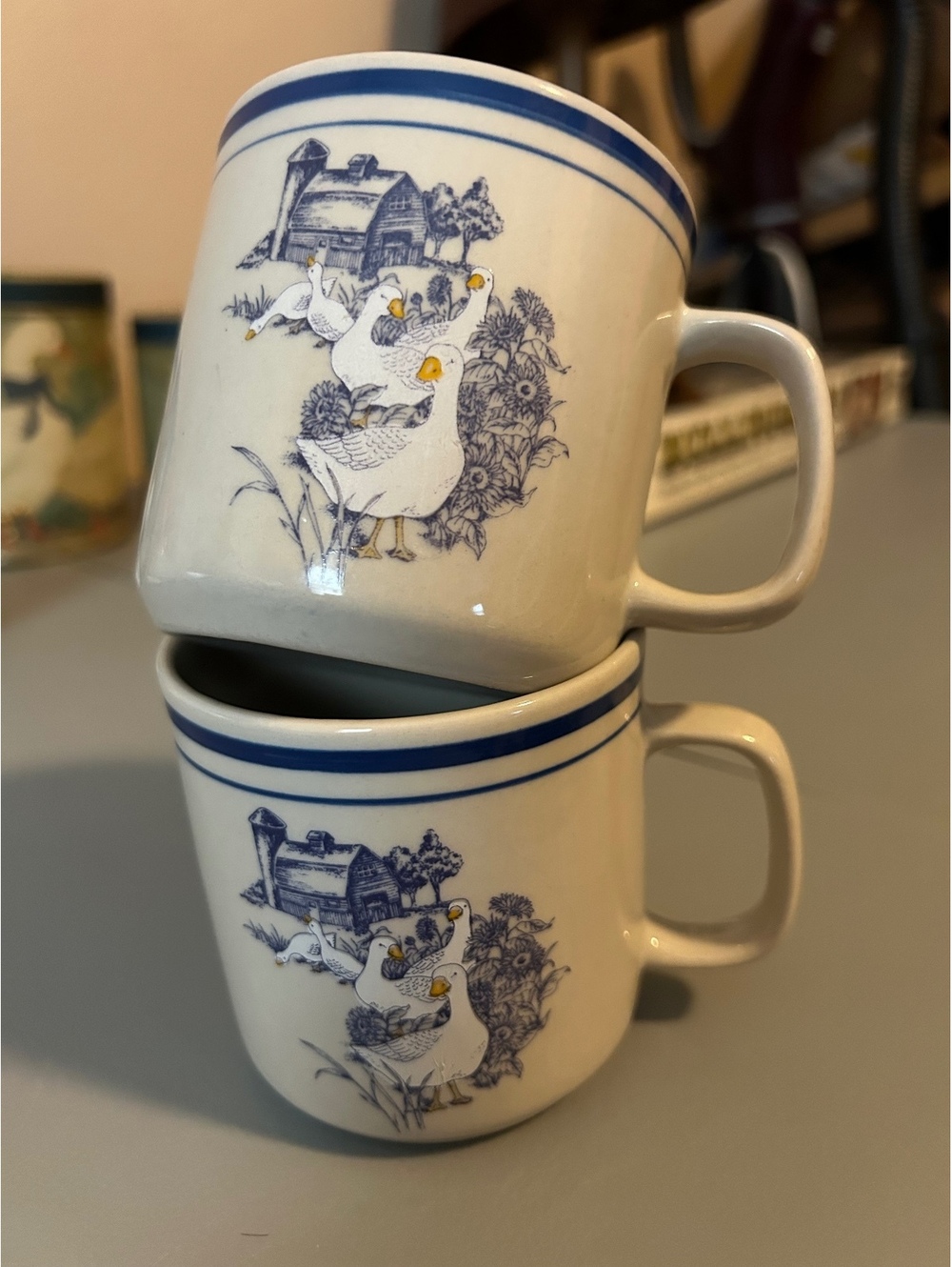 Pair of vintage goose stoneware mugs